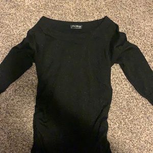 Black sweater with sparkles.